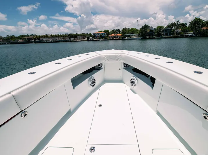  Yacht Photos Pics 2017 SeaVee Z 39 boat deck with sleek design, on calm water under a partly cloudy sky.