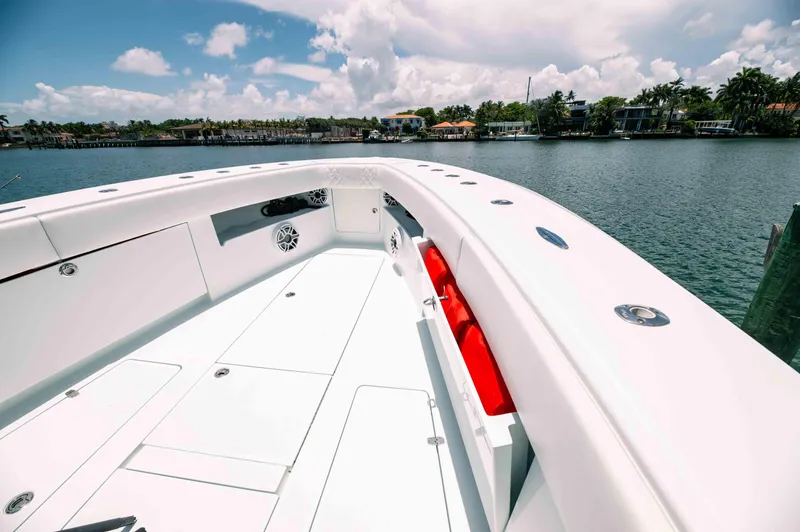  Yacht Photos Pics 2017 SeaVee Z 39 boat deck with storage compartments, speakers, and scenic waterfront view.
