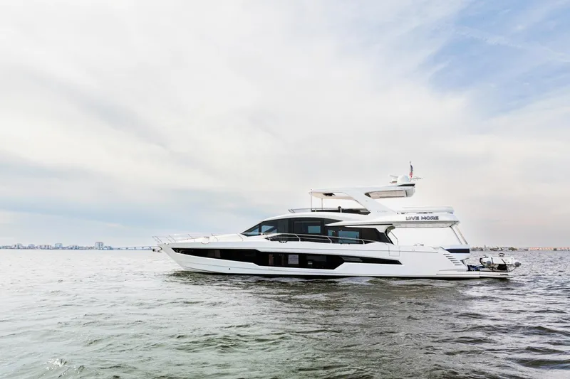 Live More Yacht Photos Pics 2021 Galeon 680 Fly yacht cruising on open water.