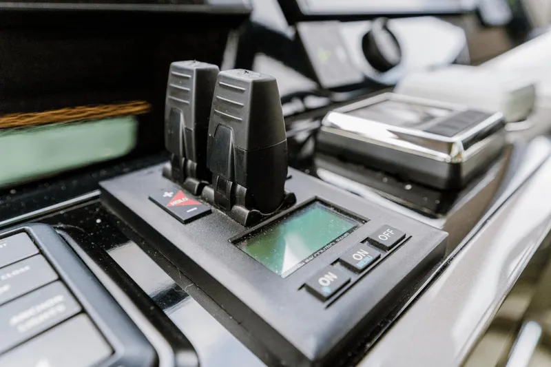 Live More Yacht Photos Pics Close-up of 2021 Galeon 680 Fly yacht control panel with switches and display.