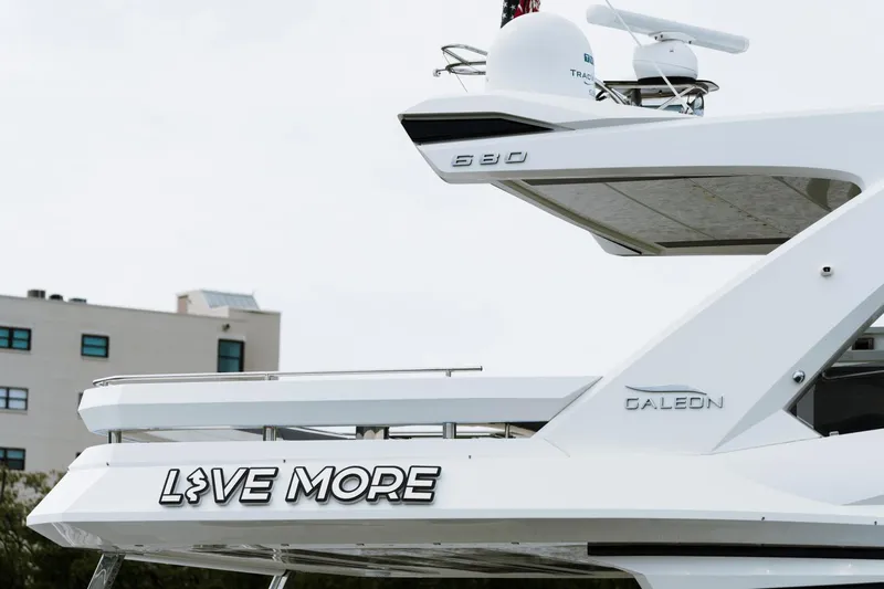 Live More Yacht Photos Pics Galeon 680 Fly 2021 yacht with "Live More" text on the side.