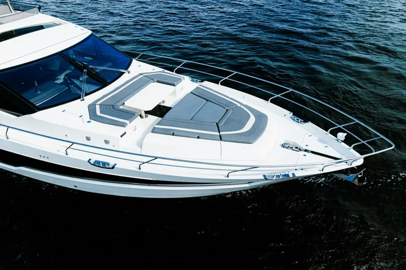 Live More Yacht Photos Pics 2021 Galeon 680 Fly yacht on water, showcasing sleek design and spacious deck.