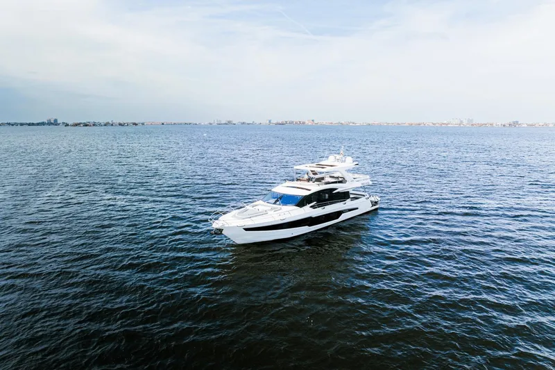 Live More Yacht Photos Pics 2021 Galeon 680 Fly yacht cruising on open water.