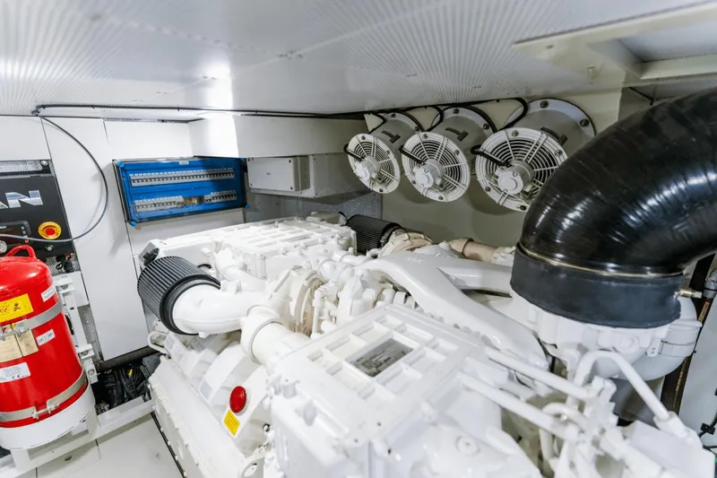 Live More Yacht Photos Pics Engine room of 2021 Galeon 680 Fly yacht with ventilation system and fire extinguisher.
