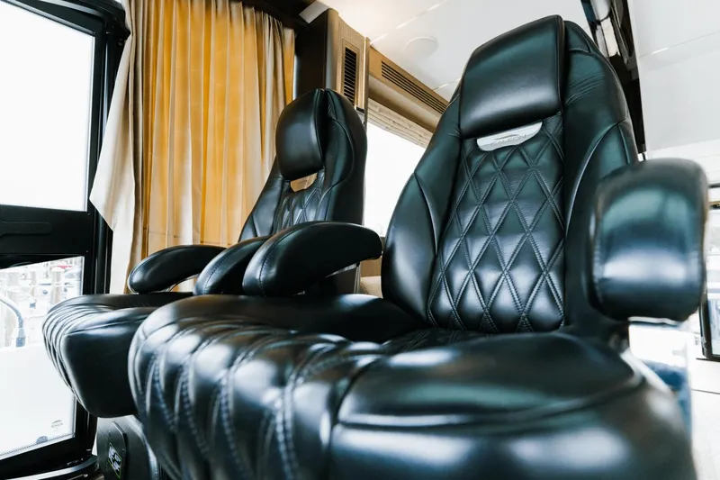 Live More Yacht Photos Pics Luxurious black leather seats in 2021 Galeon 680 Fly yacht interior.