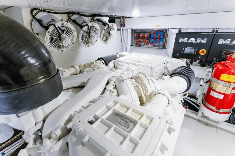 Live More Yacht Photos Pics Engine room of 2021 Galeon 680 Fly yacht with MAN engines and safety equipment.