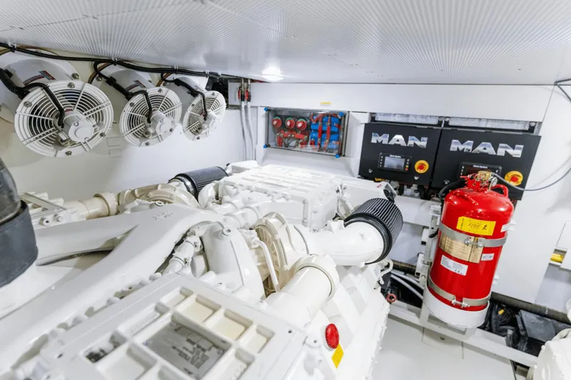 Live More Yacht Photos Pics Engine room of 2021 Galeon 680 Fly yacht with MAN engines and safety equipment.