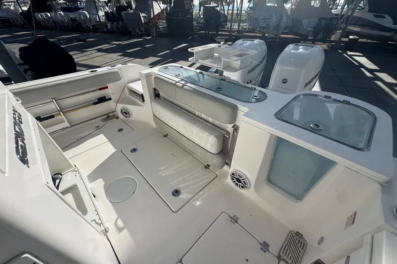  Yacht Photos Pics 2022 Sea Fox 328 Commander boat interior with seating and storage compartments.