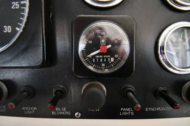 Stormy Yacht Photos Pics Dashboard of 1988 Viking 48 Convertible boat with engine hour meter and switches.