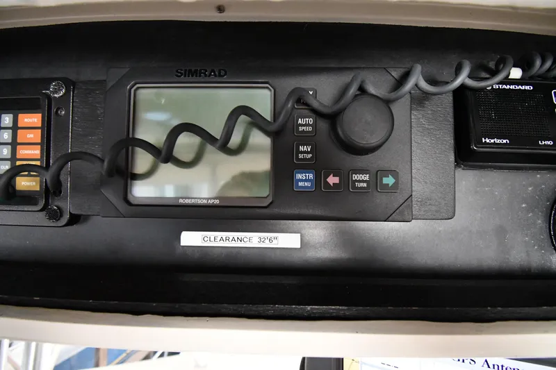 Stormy Yacht Photos Pics Control panel of 1988 Viking 48 Convertible boat with Simrad navigation system.