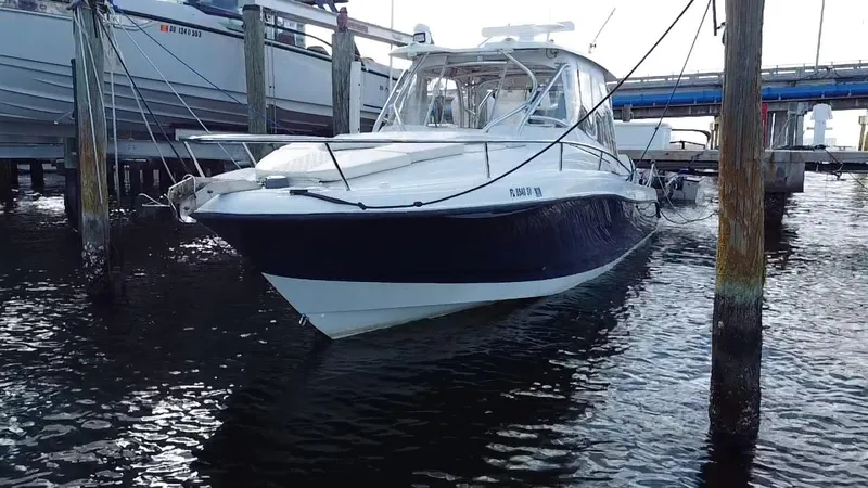  Yacht Photos Pics 2006 Hydra-Sports Vector 3300 VX boat docked at marina.