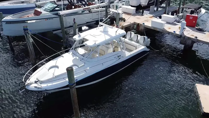  Yacht Photos Pics 2006 Hydra-Sports Vector 3300 VX boat docked at marina, aerial view.