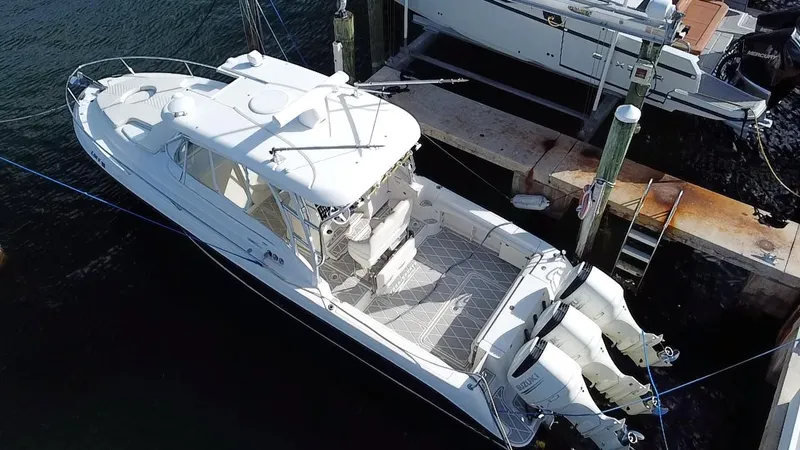  Yacht Photos Pics 2006 Hydra-Sports Vector 3300 VX boat docked with twin outboard engines.