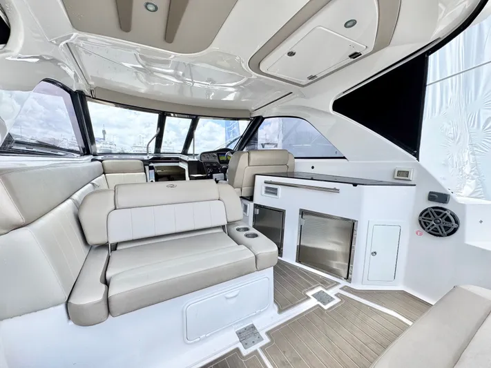 O-sea-d Yacht Photos Pics Interior of 2015 Regal 35 Sport Coupe with luxurious seating and modern amenities.