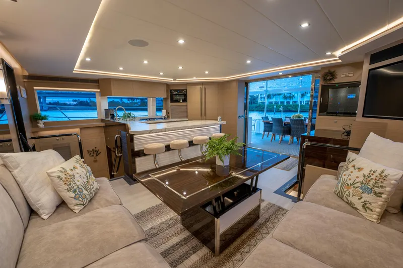 Fruition Yacht Photos Pics Luxurious Horizon PC60 yacht interior with modern design, spacious seating, and elegant lighting, 2020 model.