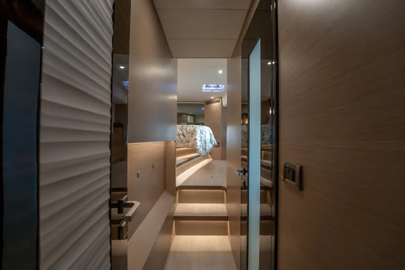 Fruition Yacht Photos Pics Luxurious interior of 2020 Horizon PC60 yacht with modern design and elegant lighting.