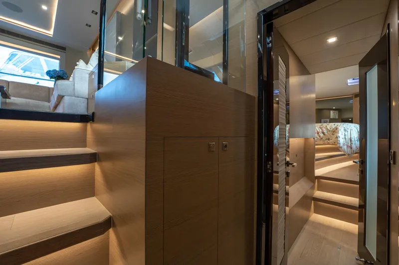 Fruition Yacht Photos Pics Luxurious interior of 2020 Horizon PC60 yacht with modern design and ambient lighting.