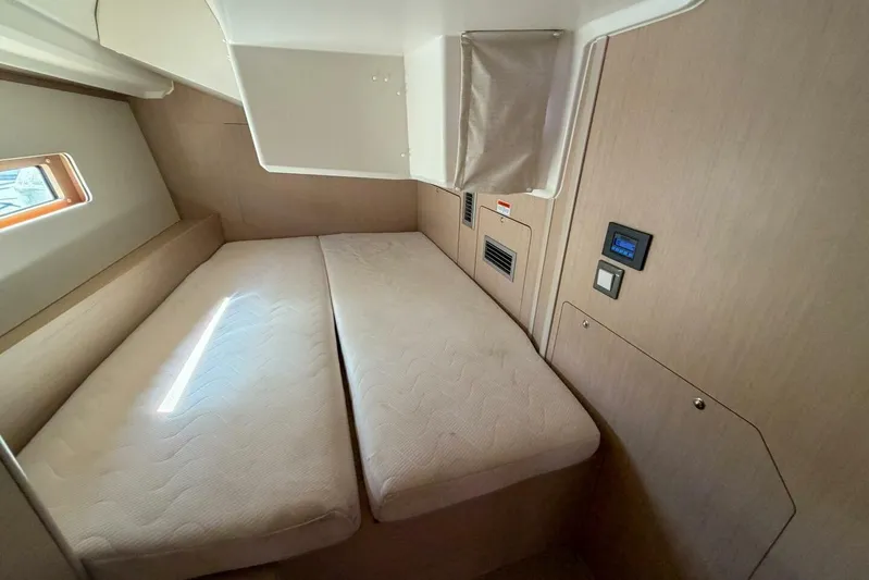 Happy Ours Yacht Photos Pics Interior cabin of 2022 Beneteau Oceanis 40.1 yacht with twin beds and modern design.