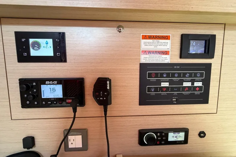 Happy Ours Yacht Photos Pics Control panel of a 2022 Beneteau Oceanis 40.1 yacht with navigation and communication systems.