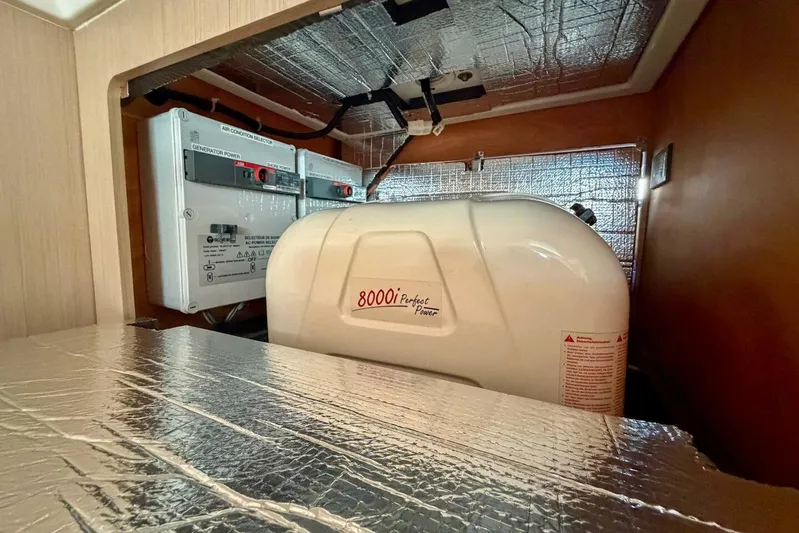 Happy Ours Yacht Photos Pics Engine compartment of 2022 Beneteau Oceanis 40.1 yacht with generator and insulation.