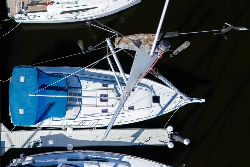 Happy Ours Yacht Photos Pics Aerial view of 2022 Beneteau Oceanis 40.1 sailboat docked at marina.