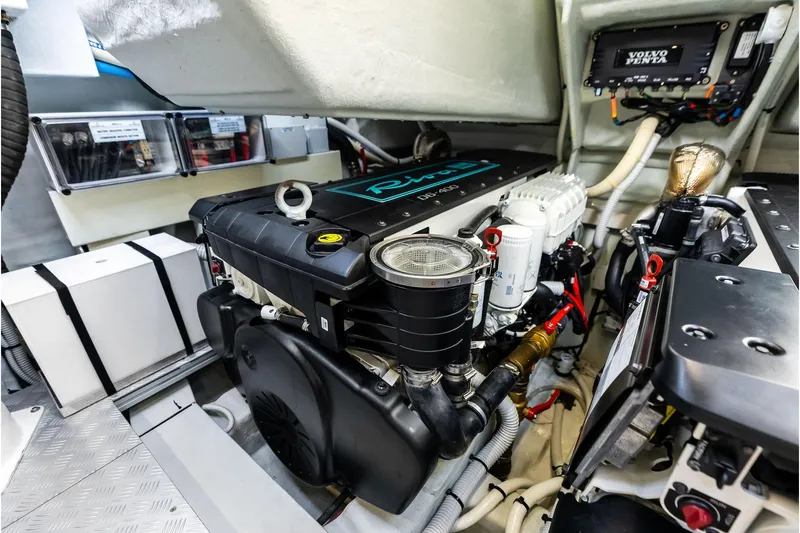 Grey Yacht Photos Pics Engine compartment of 2023 Riva Rivamare boat, featuring Volvo Penta components.