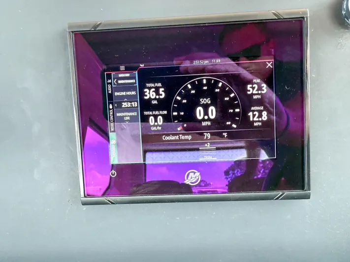 Willow Run Yacht Photos Pics Dashboard display of a 2021 Axopar 28 CABIN showing fuel and speed metrics.