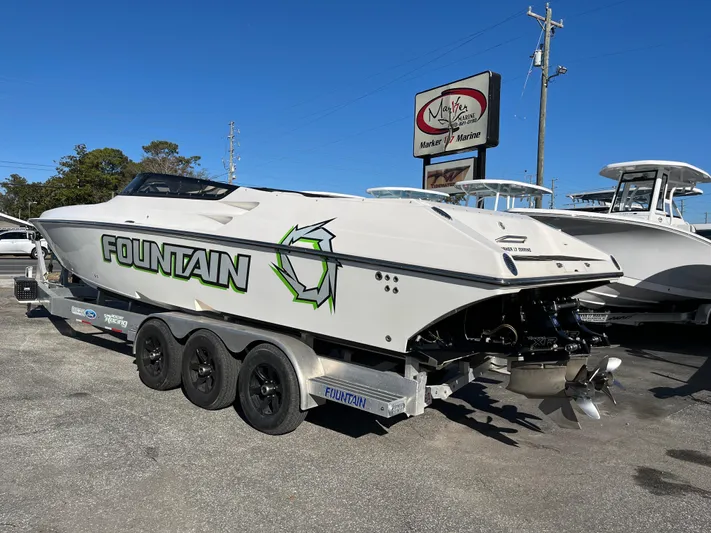  Yacht Photos Pics 2007 Fountain 35 Lightning boat on trailer, side view.