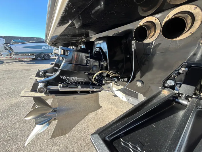  Yacht Photos Pics Rear view of a 2007 Fountain 35 Lightning boat with Mercury drive.