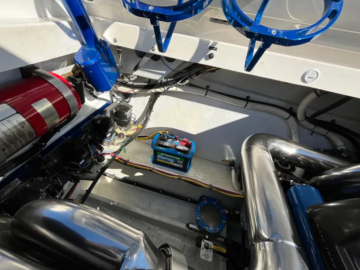  Yacht Photos Pics Engine compartment of 2007 Fountain 35 Lightning boat with battery and exhaust.