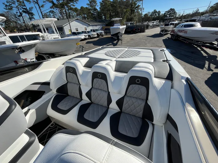  Yacht Photos Pics Interior of a 2007 Fountain 35 Lightning boat with white seating.