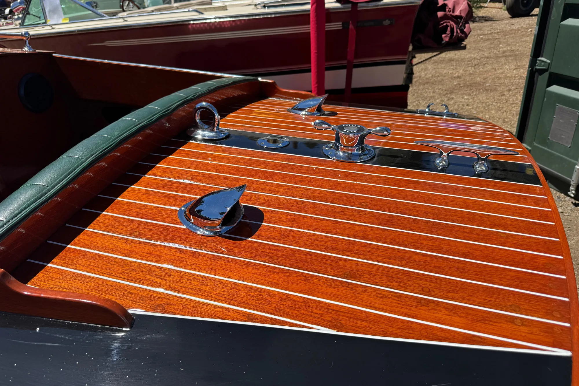 1987 Grand Craft Triple Cockpit Runabout with polished wood deck and chrome fittings.