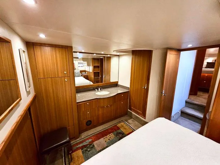  Yacht Photos Pics Luxurious interior of 2000 Bayliner 5288 Pilot House Motoryacht with wood cabinetry and modern amenities.