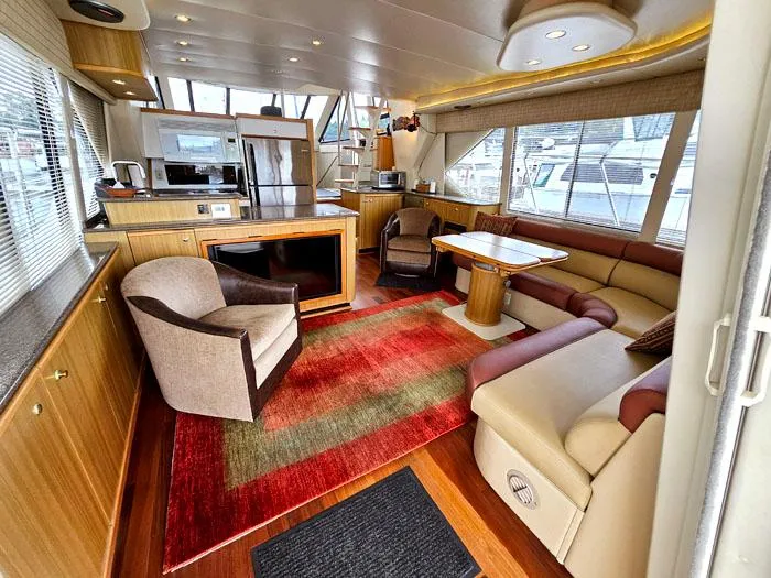  Yacht Photos Pics Luxurious interior of 2000 Bayliner 5288 Pilot House Motoryacht with modern furnishings.