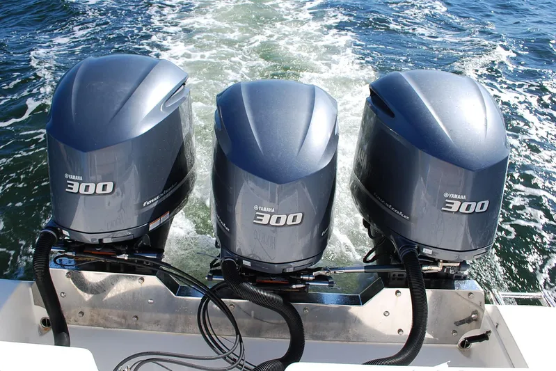 Playin Hooky Yacht Photos Pics Triple Yamaha 300 outboard engines on a 2019 Cobia 344 Center Console boat.