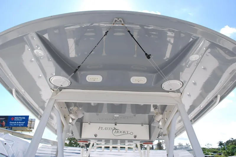Playin Hooky Yacht Photos Pics 2019 Cobia 344 Center Console boat, view of the underside of the T-top.