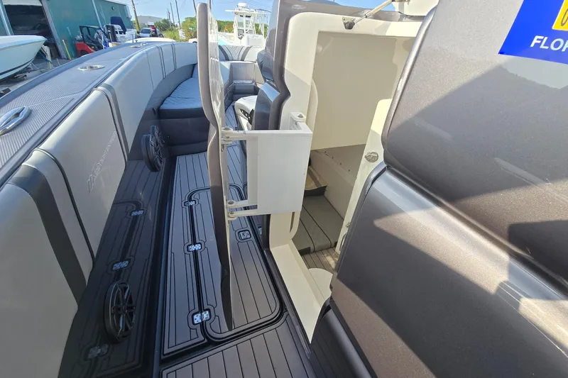 Yacht Photos Pics 2020 Midnight Express 37 Center Console boat interior with seating and storage area.