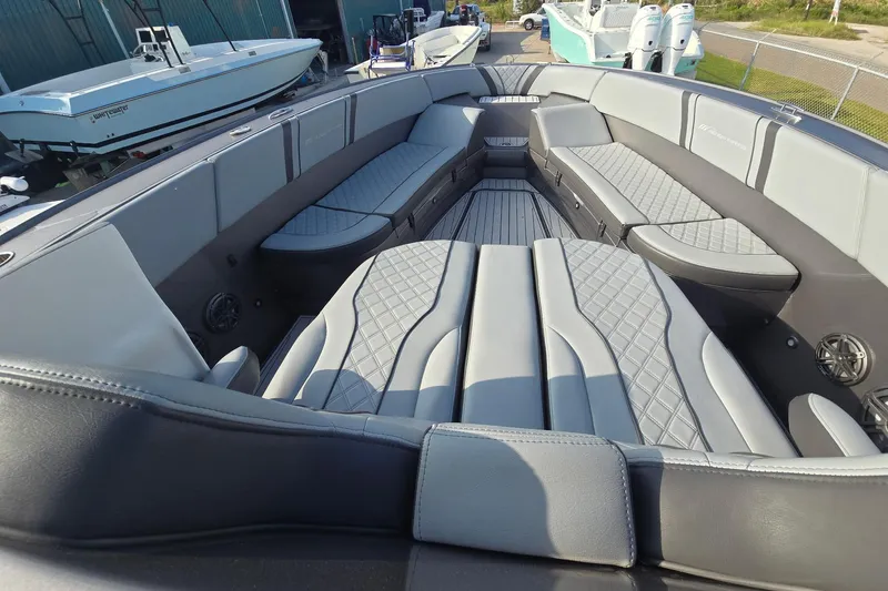  Yacht Photos Pics Luxurious seating on 2020 Midnight Express 37 Center Console boat, featuring sleek design and comfort.