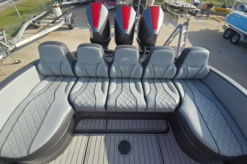  Yacht Photos Pics Luxury seating on 2020 Midnight Express 37 Center Console boat, featuring stylish gray upholstery.