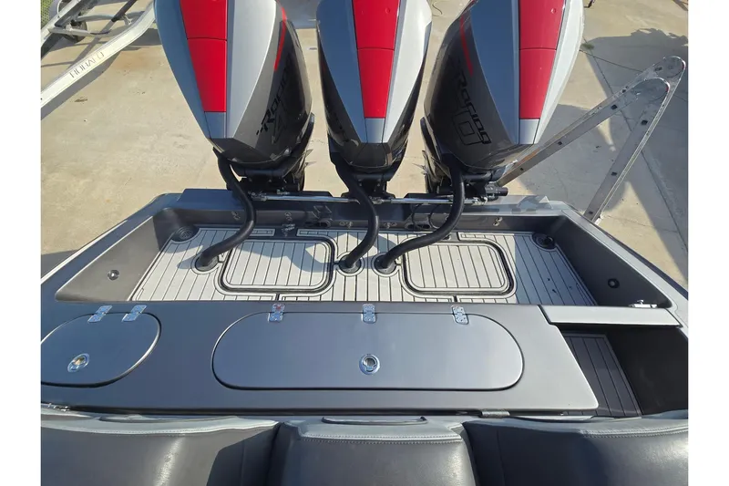  Yacht Photos Pics 2020 Midnight Express 37 Center Console with triple outboard engines, rear deck view.
