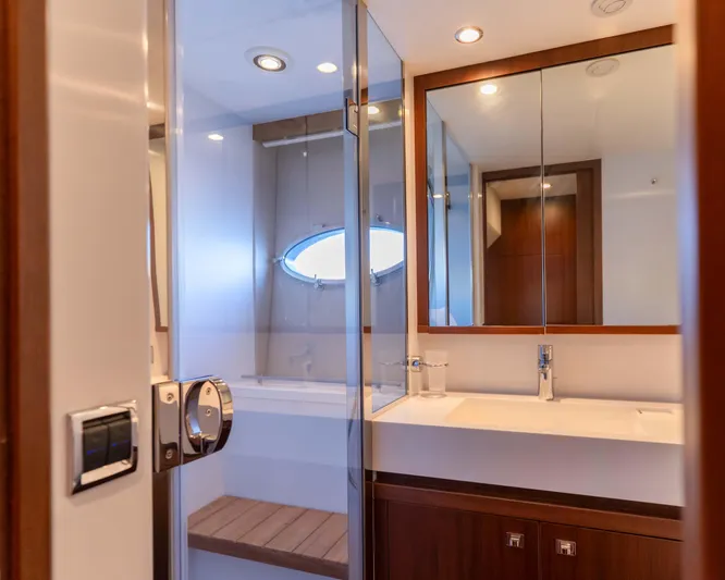  Yacht Photos Pics Luxurious bathroom interior on 2011 Princess V62 yacht, featuring modern fixtures and elegant design.