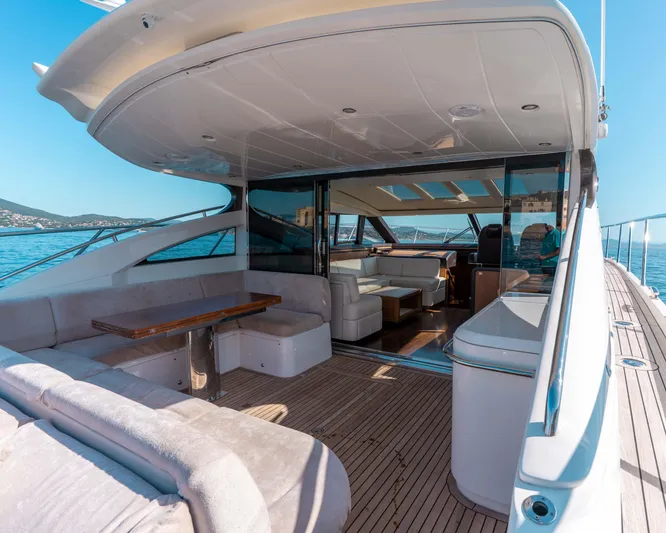  Yacht Photos Pics Luxurious 2011 Princess V62 yacht with spacious deck and elegant interior.