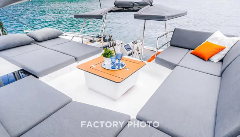 Bonova Yacht Photos Pics Luxurious seating area on 2022 Fountaine Pajot Tanna 47 yacht with ocean view.