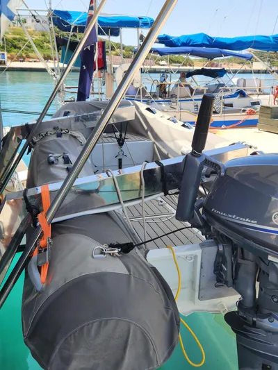 Bonova Yacht Photos Pics 2022 Fountaine Pajot Tanna 47 yacht with dinghy and outboard motor in marina.