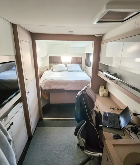 Bonova Yacht Photos Pics Interior of 2022 Fountaine Pajot Tanna 47 yacht with bed and workspace.