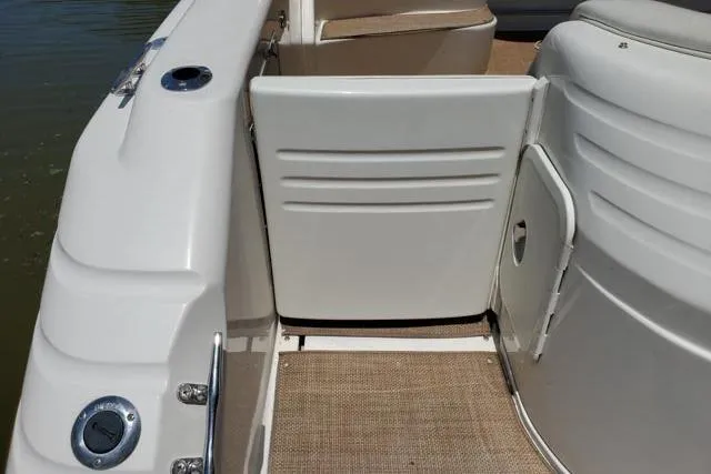 Basic Instinct Yacht Photos Pics 1995 Sea Ray 440 Express Bridge deck with seating and access gate.