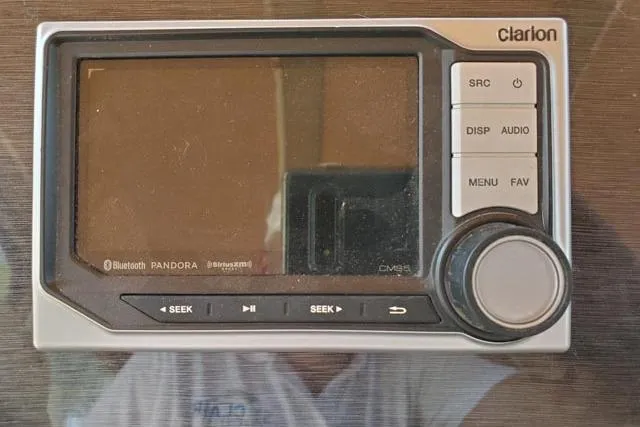 Basic Instinct Yacht Photos Pics Clarion audio system in 1995 Sea Ray 440 Express Bridge boat.