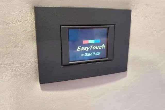 Basic Instinct Yacht Photos Pics EasyTouch control panel by Micro-Air on 1995 Sea Ray 440 Express Bridge.