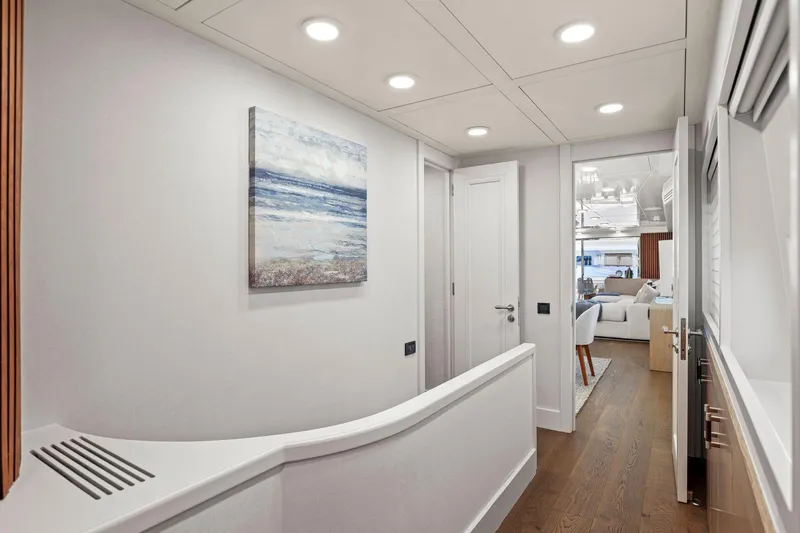 Panacea Yacht Photos Pics Luxurious interior hallway of 2011 Mengi Yay 115 MY yacht with modern decor.