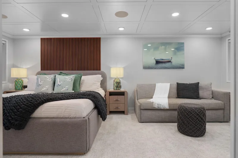 Panacea Yacht Photos Pics Luxurious bedroom on 2011 Mengi Yay 115 MY yacht with elegant decor and cozy seating.
